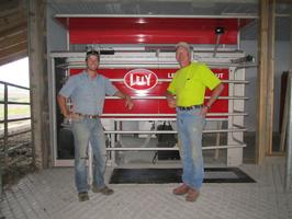 Ryker and Jim in front of newly placed Lely_thumb
